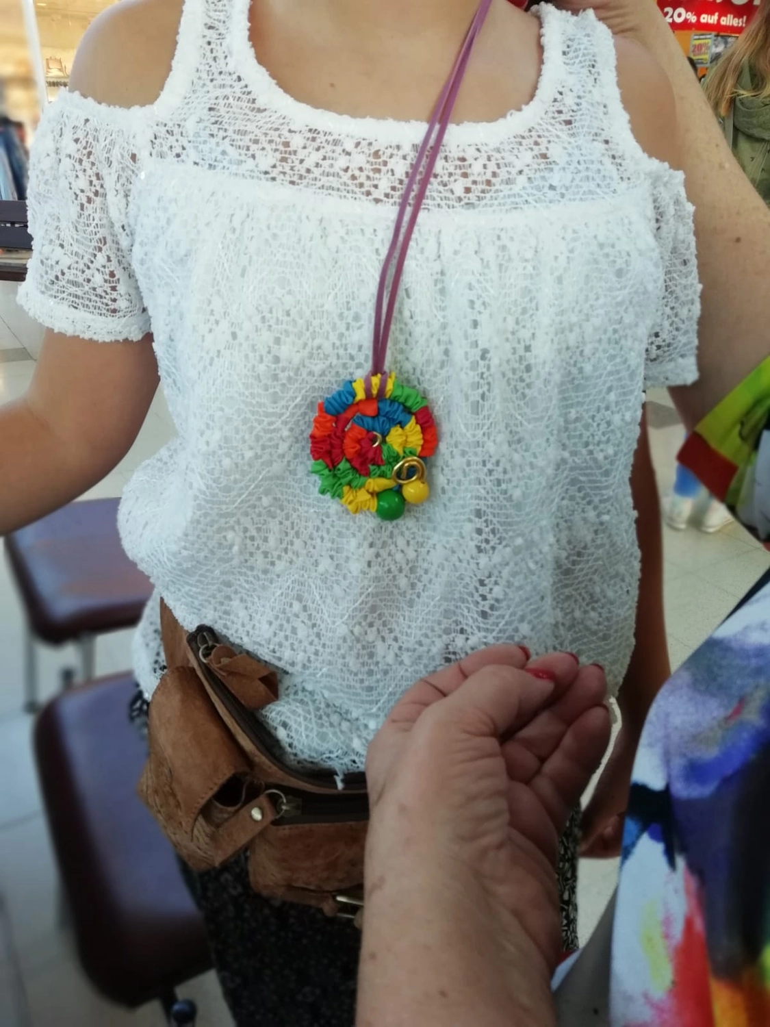 Moments Veranstaltungsagentur - Bunte Blumenkette selbst gebastelt